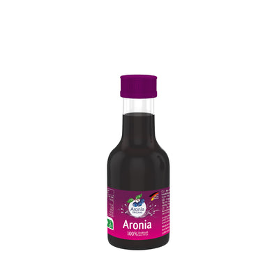 Small 100-ml bottle of aronia 100% not-from-concentrate juice, dark red juice, magenta label, purple cap, Organic seal.